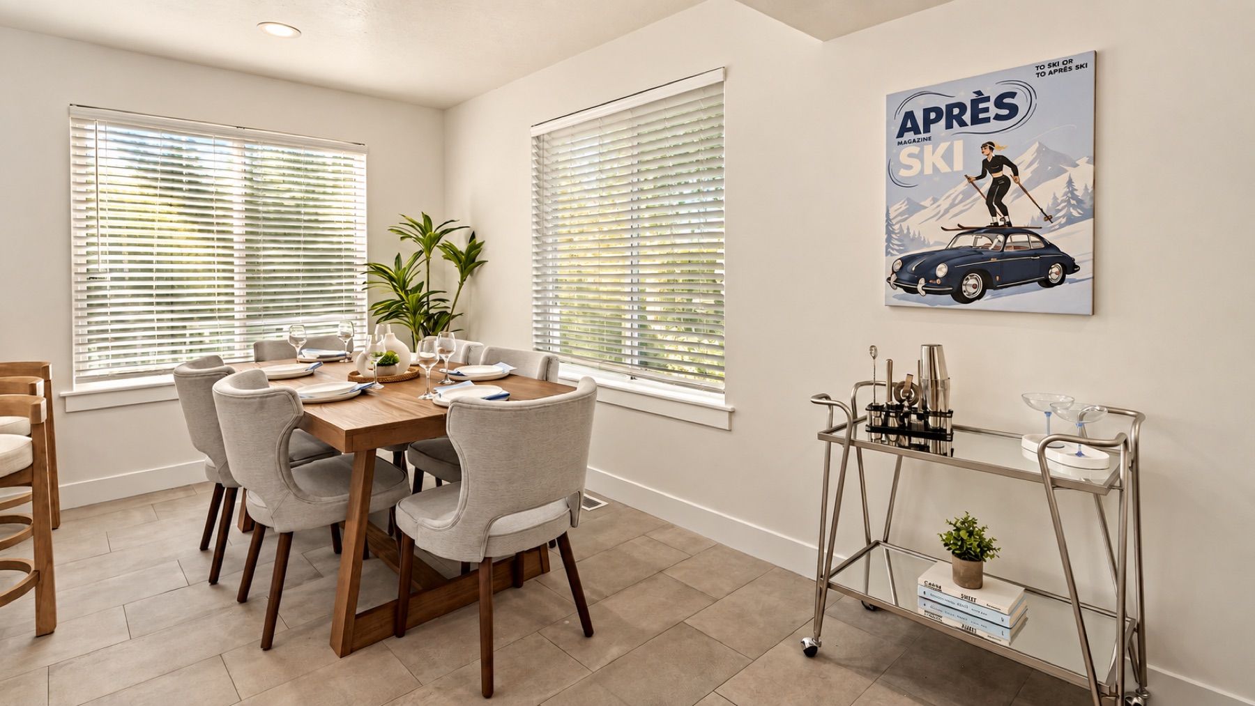 The dining nook, the Après Ski print, and the bar cart waiting for the hour after.