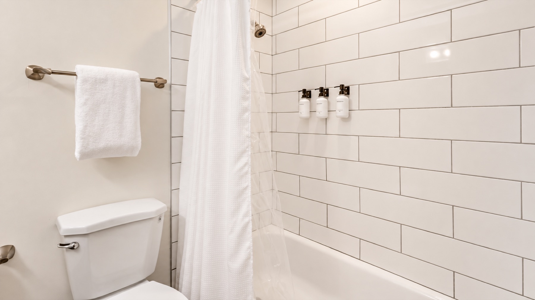 A real tub in white subway tile, for the night after the long day.