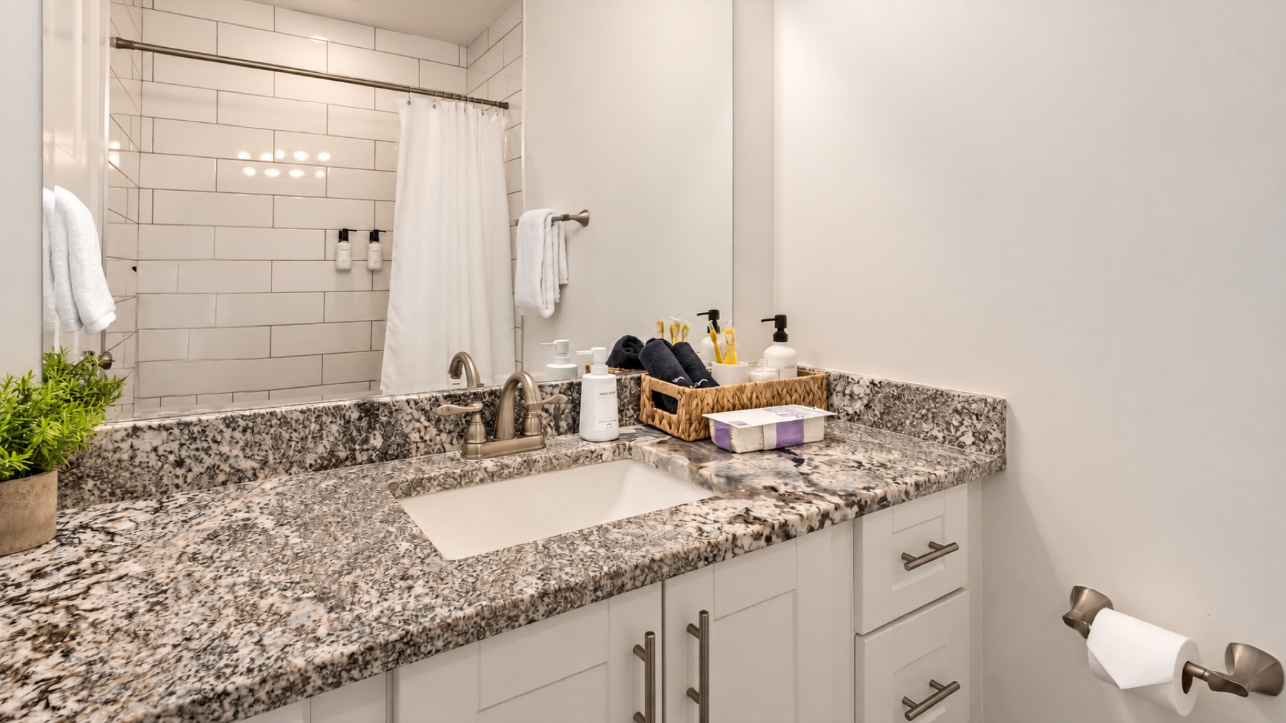 Room at the vanity for two toiletry bags.