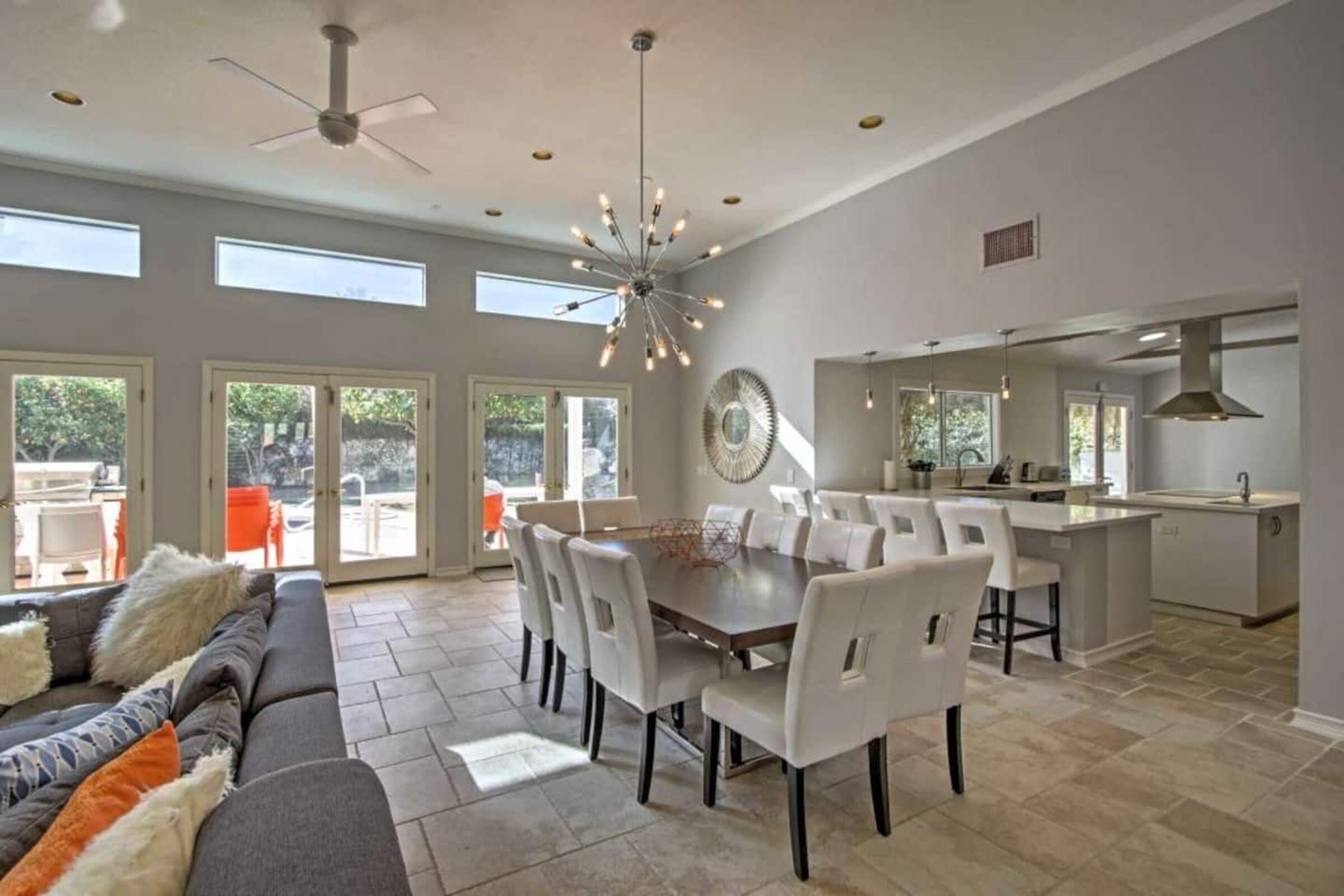 The dining room — long table beside the open kitchen
