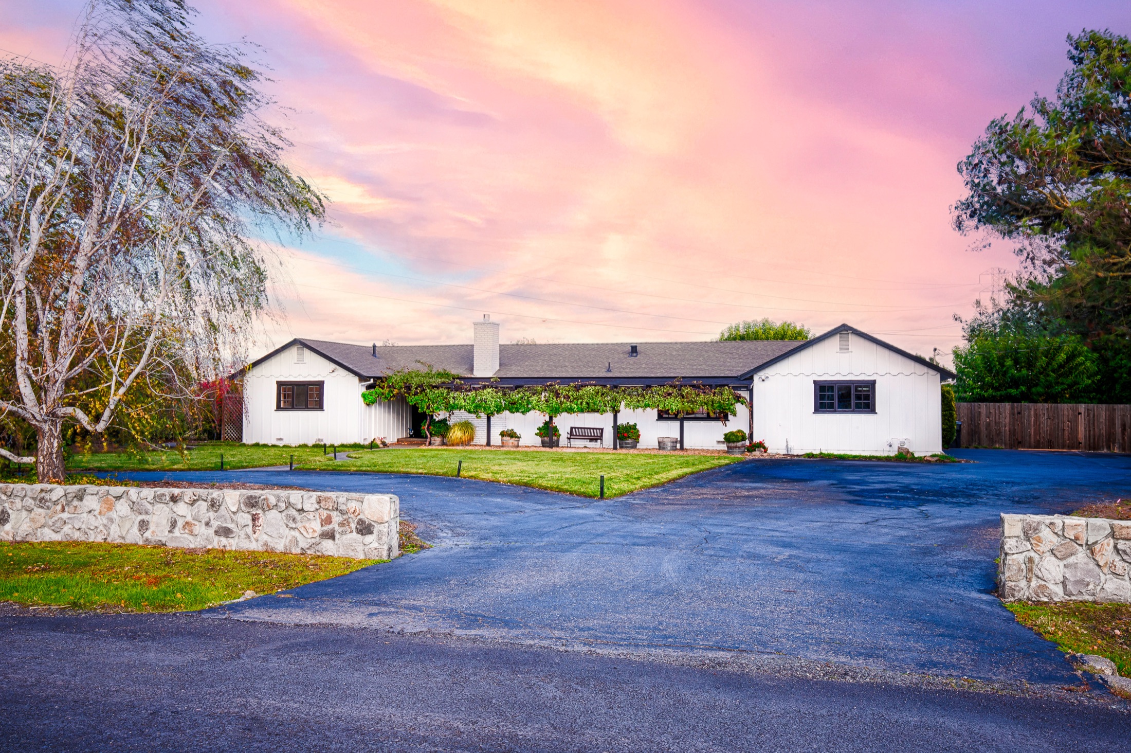 Montgomery House — a white ranch under a pink Sonoma dusk